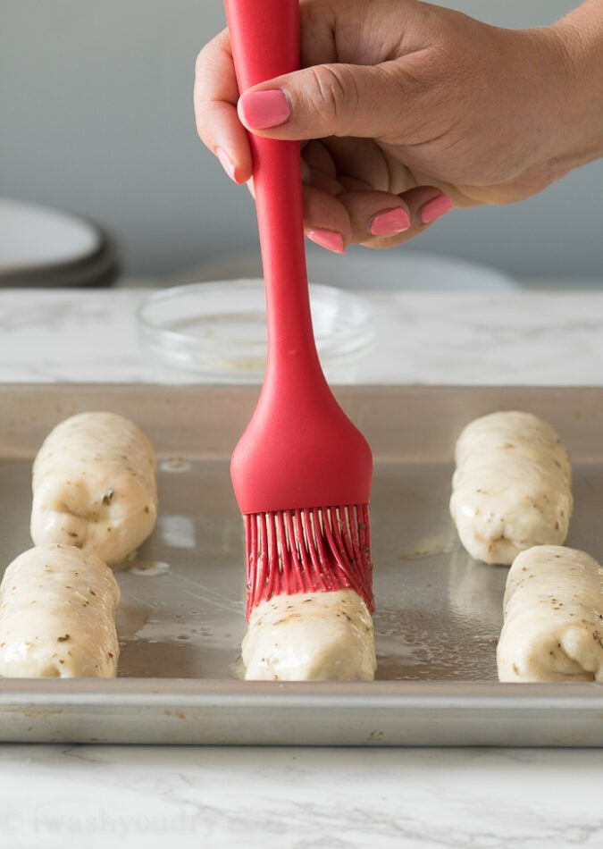 Wrap up the Philly Cheese Steak Pizza Sticks, making sure to pinch the seams closed and lay them seam side down.