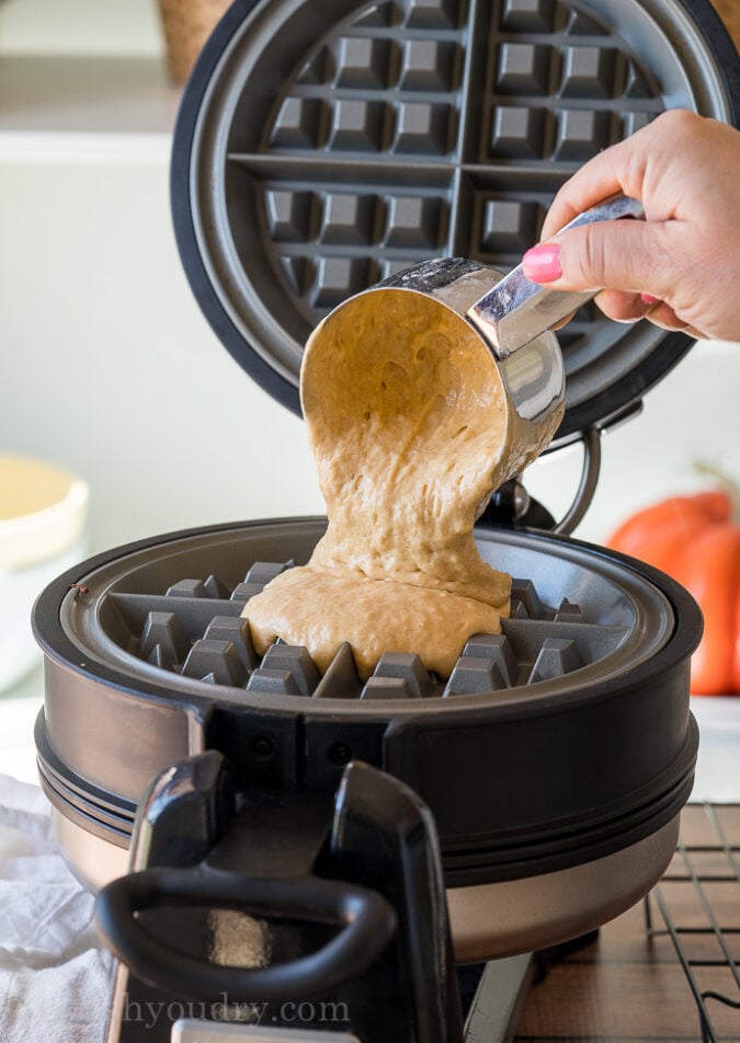 Pour your prepared waffle batter into the preheated waffle iron.