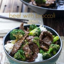 A bowl of white rice with beef with broccoli on top