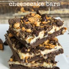 Stacked pile of three Butterfinger Cheesecake Bars
