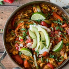 A bowl of food on a table, with Chicken and Fajita