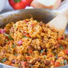 A pan filled with food, with rice and beans