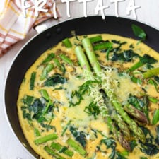 A skillet of food with a spinach asparagus frittata