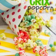 Colorful Fruity Trix Popcorn showcased in a paper cone with red polka dots