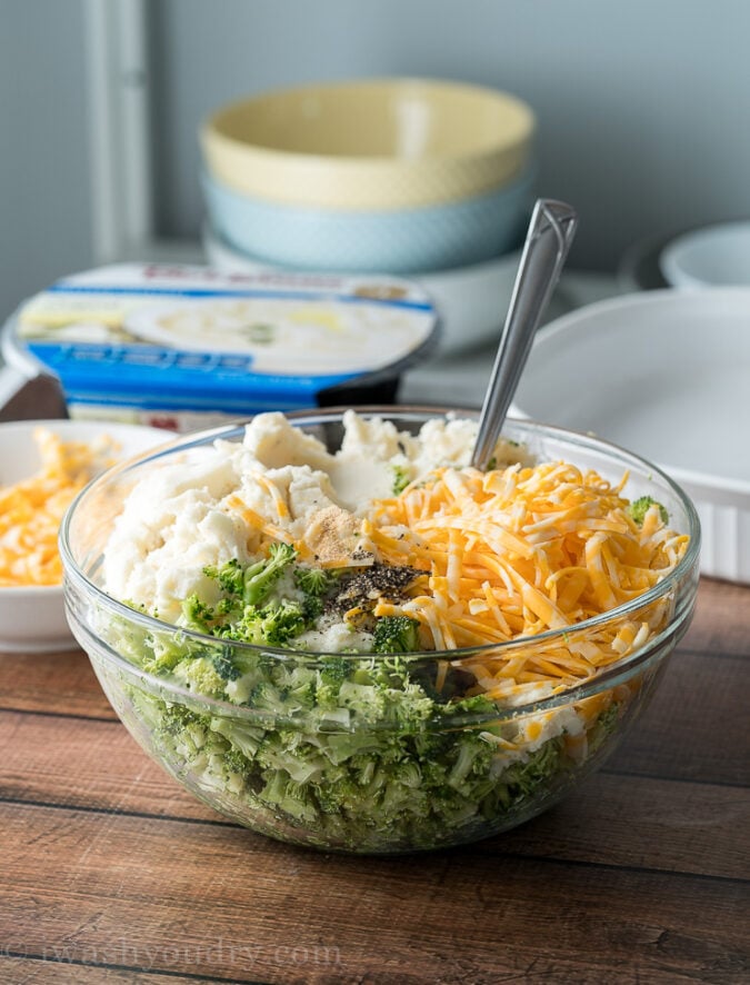 Mix together broccoli, cheese, mashed potatoes and some seasonings to make this super simple mashed potato casserole!