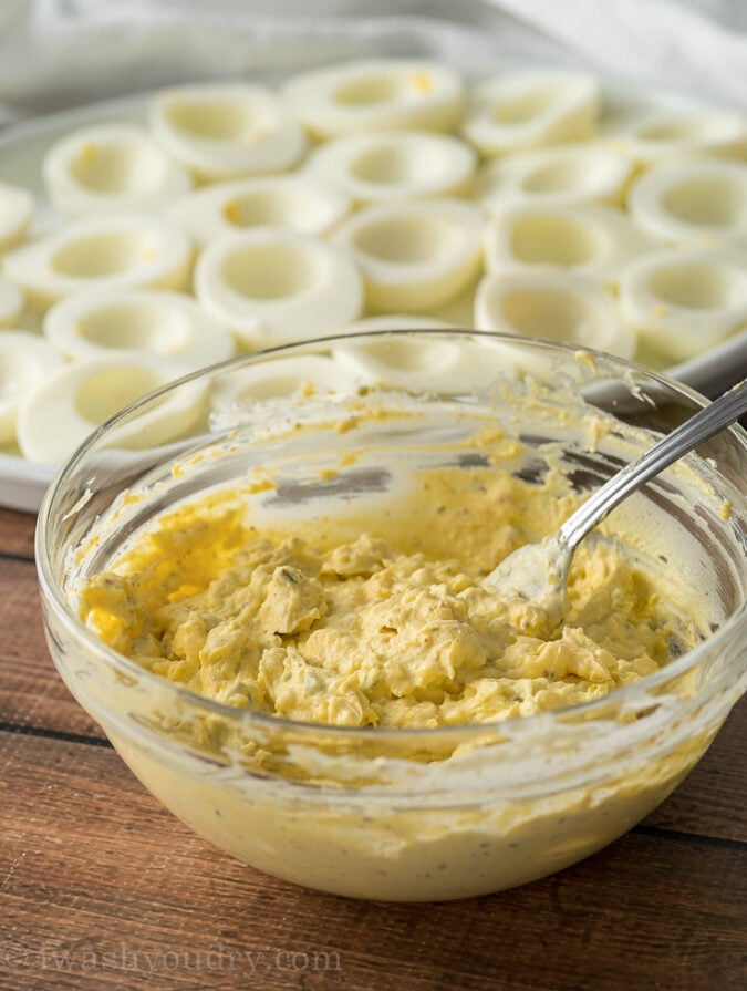 Combine the Deviled Egg filling ingredients in a bowl and mash until desired consistency. Fill up the egg whites and enjoy!