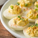 A plate of deviled eggs on a table