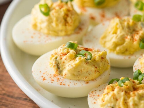 A plate of deviled eggs on a table