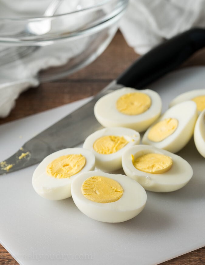 Easily hard boil eggs in the Instant Pot or on the stove top for this super delicious Deviled Egg Recipe!