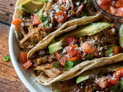 OMG! These Crispy Instant Pot Pork Carnitas are seriously SO GOOD! I couldn't stop eating the pork off the tray!