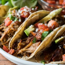 DELICIOUS! This super easy Pork Carnitas recipe is ready in a fraction of the time and tastes amazing!