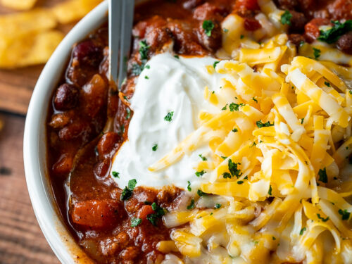 A plate of chili on a table