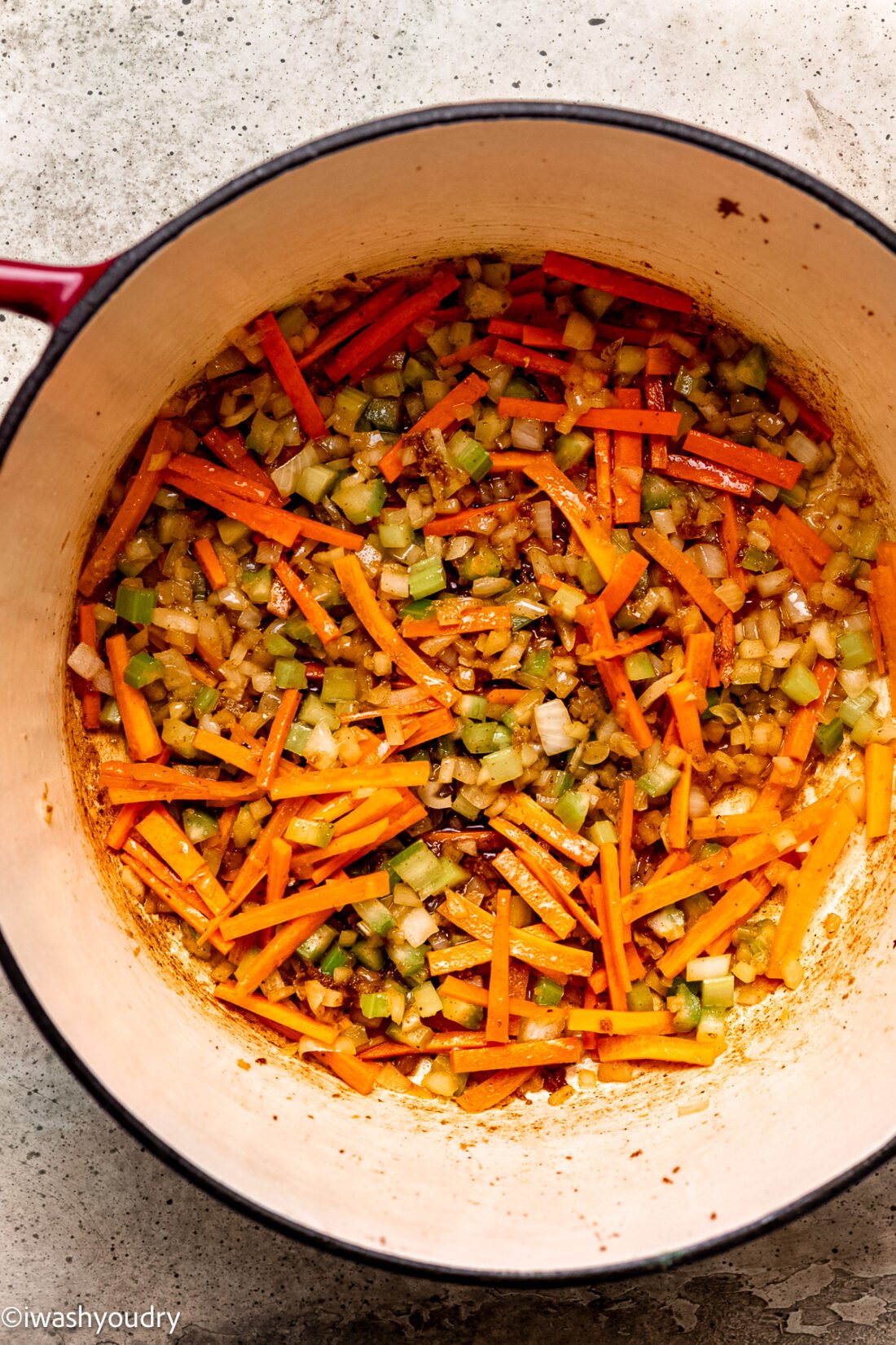 sautéed carrots, celery and onion in dutch oven pot.