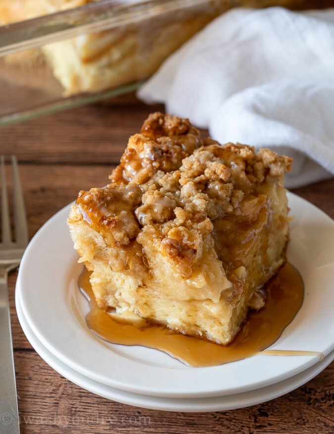 YUM! This super easy French Toast Casserole recipe is soaked overnight in an egg mixture, topped with a brown sugar crumble, then baked to perfection!