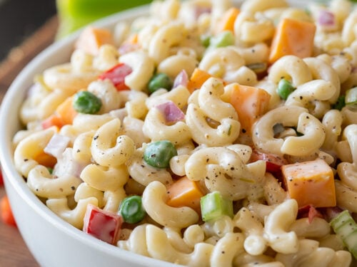 YUM! This Classic Macaroni Salad Recipe is super easy and the perfect side dish for all those summer potlucks!