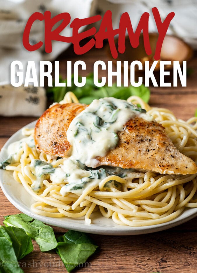 This Creamy Garlic Chicken Recipe with spinach in a creamy parmesan cheese sauce is delicious over over hot pasta.
