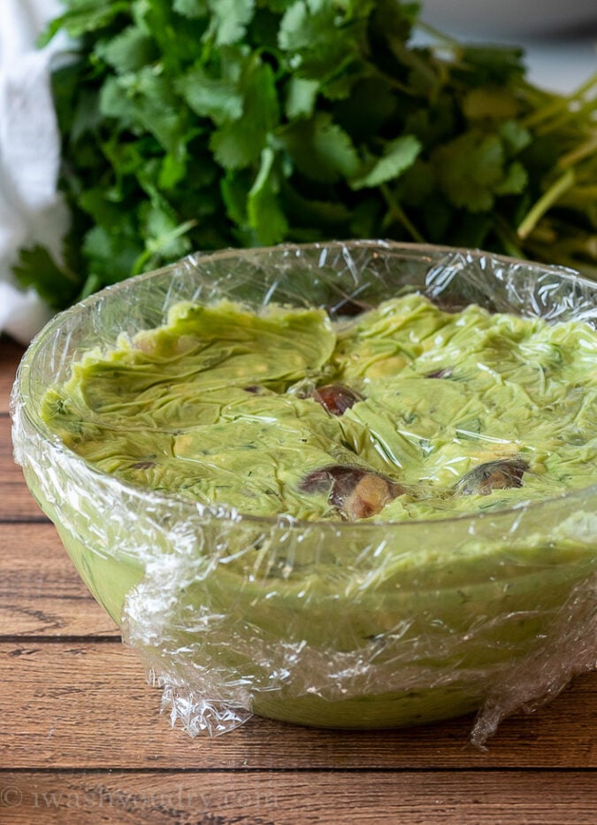 Keep your guacamole from turning brown by covering with plastic wrap and two more great tips!