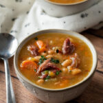 Serve this hearty Ham Bone Soup with soft rolls for an easy weeknight dinner!