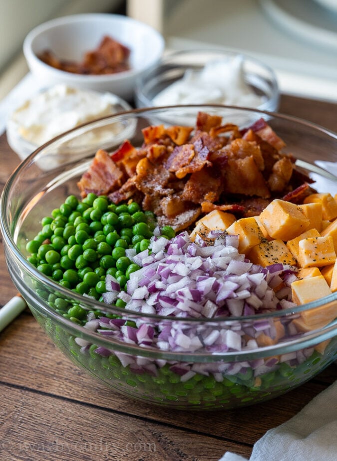 This creamy green pea salad with bacon is an easy spring side dish for Easter or bbq's!
