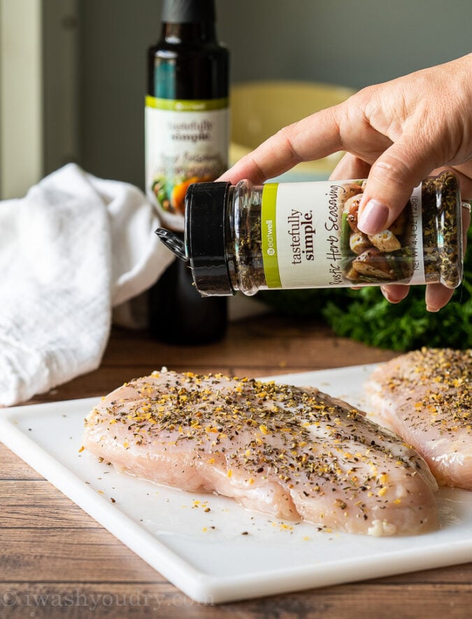 Sprinkle on the Tastefully Simple Rustic Herb Seasoning to perfectly season your chicken breasts