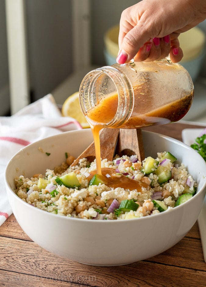 Drizzle the homemade Italian salad dressing over the quinoa salad and toss to coat.
