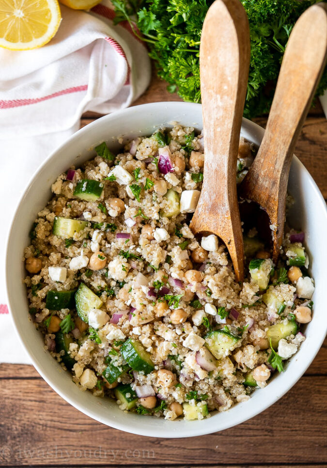 This Chickpea Quinoa Salad Recipe is filled with crisp cucumbers, feta cheese and tender quinoa, tossed in a deliciously easy dressing.