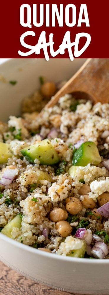 This Chickpea Quinoa Salad Recipe is filled with crisp cucumbers, feta cheese and tender quinoa, tossed in a deliciously easy dressing.