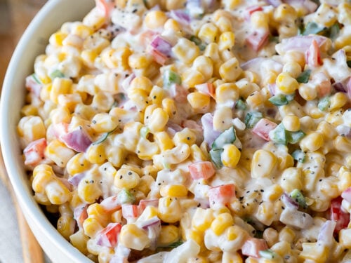 Serve this creamy corn salad at all your summer pot lucks and bbq's and watch it disappear so fast!