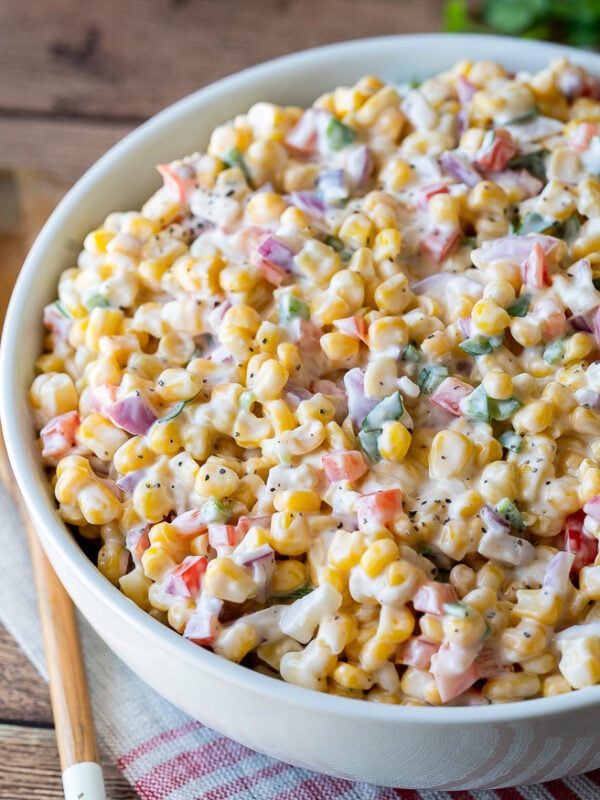 Serve this creamy corn salad at all your summer pot lucks and bbq's and watch it disappear so fast!