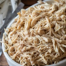 Deliciously seasoned shredded chicken breast made right in the slow cooker! So tender and juicy!