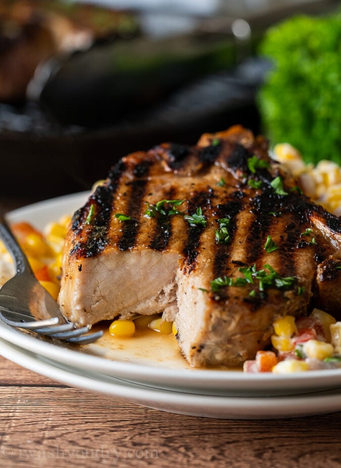 Tender and juicy grilled pork chops are a super quick and easy recipe for bbq's and cookouts!