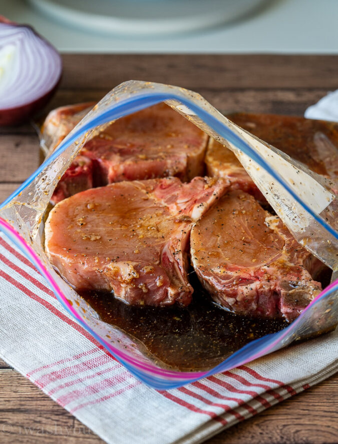 This mega flavorful pork chop marinade is easy to throw together and results in super delicious pork chops!