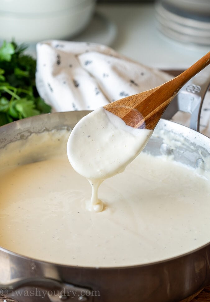 thick and creamy sauce in saucepan