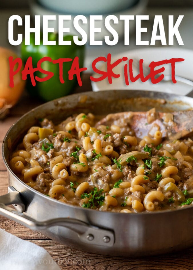 This Philly Cheesesteak Pasta Skillet is a childhood favorite! Filled with tender pasta, hearty ground beef and cheese in a delicious sauce that's all made in just ONE PAN!
