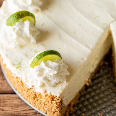 This Key Lime No Bake Cheesecake is perfectly smooth and creamy with a crisp graham cracker crust.