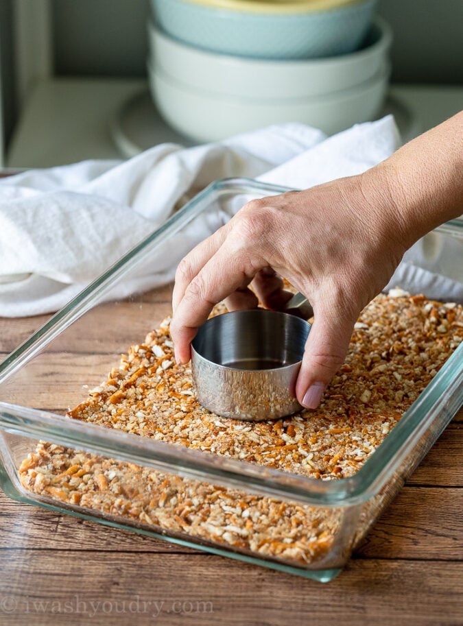 Lightly crush pretzels to form the crust for this super easy jello salad recipe. 