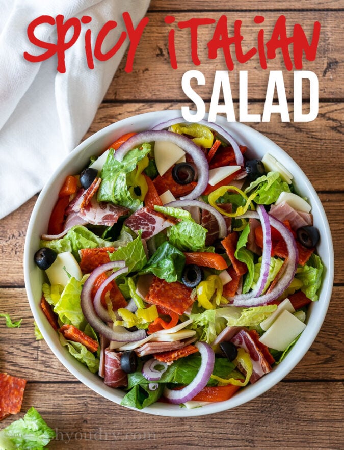 This Spicy Italian Salad Recipe is filled with all the flavors of the classic sandwich and topped with a creamy Italian dressing!