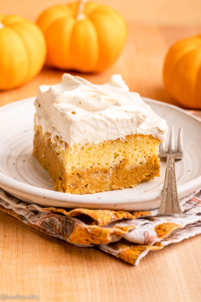 slice of pumpkin magic cake on plate with fork