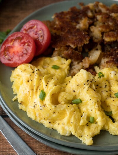 This super easy Fluffy Scrambled Eggs Recipe is more of a technique rather than recipe, resulting in creamy, fluffy eggs every time!
