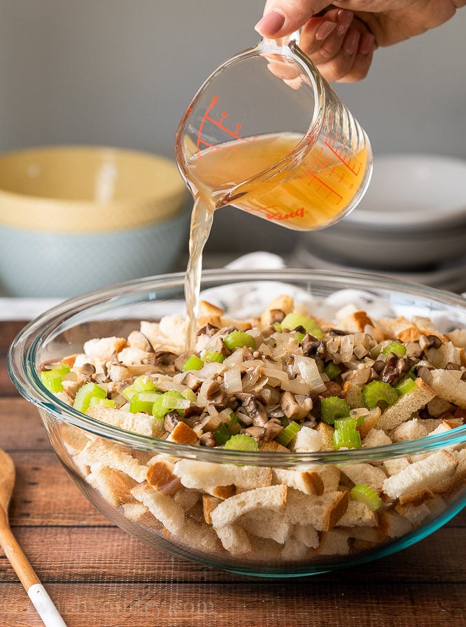 Pour the chicken broth over the bread cubes and veggies