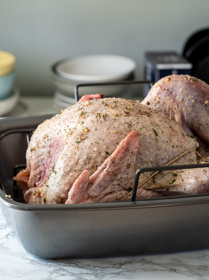 Rub down the turkey with the dry brine ingredients and let sit in fridge for 24 hours covered.