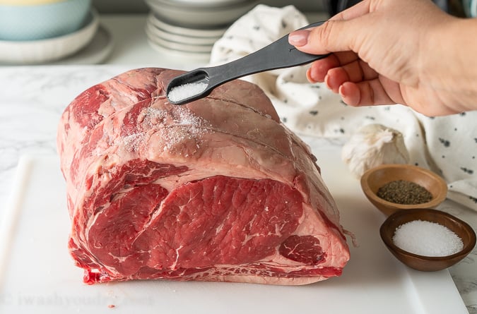 Salt your Standing Rib Roast and let sit out for at least 3 hours to come to room temperature.