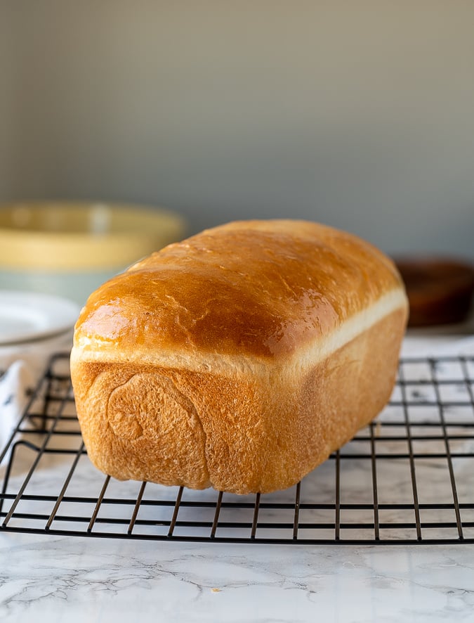 Perfect Homemade Bread cooling on a wire rack