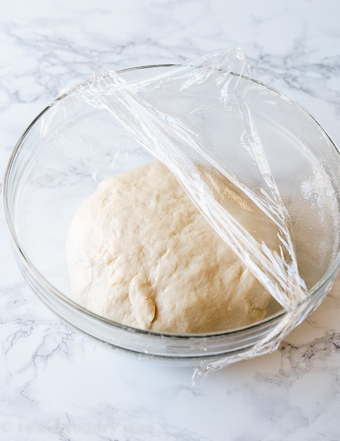 Shape bread dough into a ball and let rise until double in size.