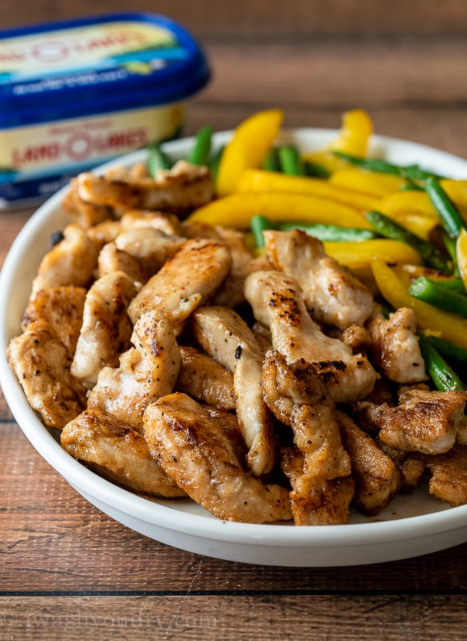 Tender and juicy chicken breast strips made alongside tender green beans and yellow pepper strips