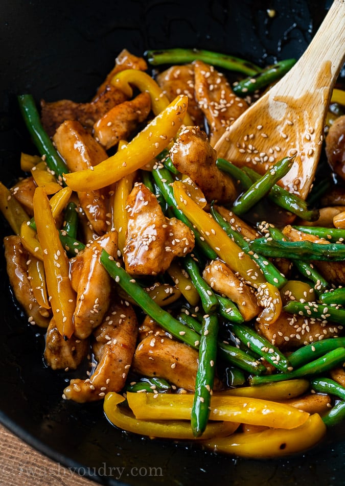 Honey Sesame Chicken Stir Fry in a large wok