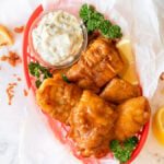 This Crispy Beer Batter Fish Recipe is made with basic ingredients and creates a crunchy coating around flaky, tender white fish! Fried fish is great with homemade Tartar Sauce or used to make crispy fish tacos! 
