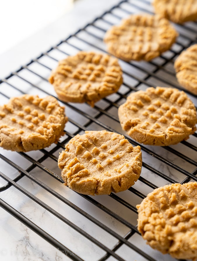 Soft and chewy Peanut Butter Cookies on a cooling rack.