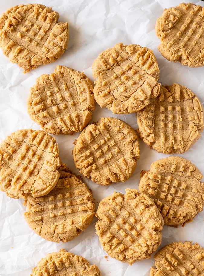 These 5 Ingredient Peanut Butter Cookies are so simple and quick to make. No flour, no chilling, resulting in a chewy, dense inside with a crisp cookie outside. 