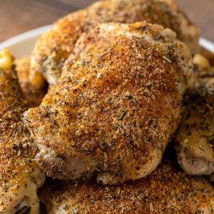 Close up image of oven roasted chicken thighs on a platter.